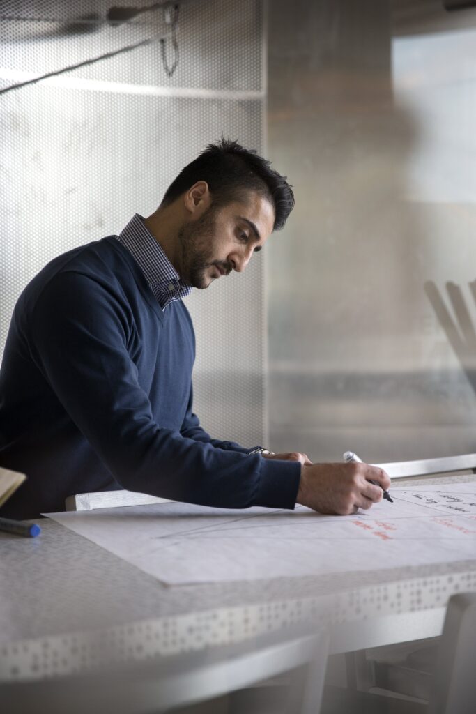 Shakeel Dar leading a strategy session at Unite Consulting